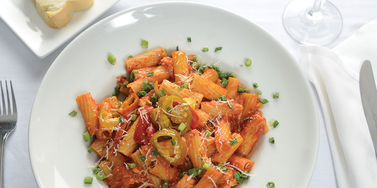 Attilio’s signature dishes The Original Chicken RiggiesJulie's Signature Pasta PieGouda Arancini